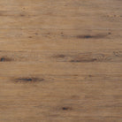 Close up of Four Hands 72" Glenview Dining Table in Weathered Oak Veneer on a white background at Addison West