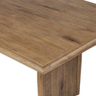 Close up of Four Hands 72" Glenview Dining Table in Weathered Oak Veneer on a white background at Addison West