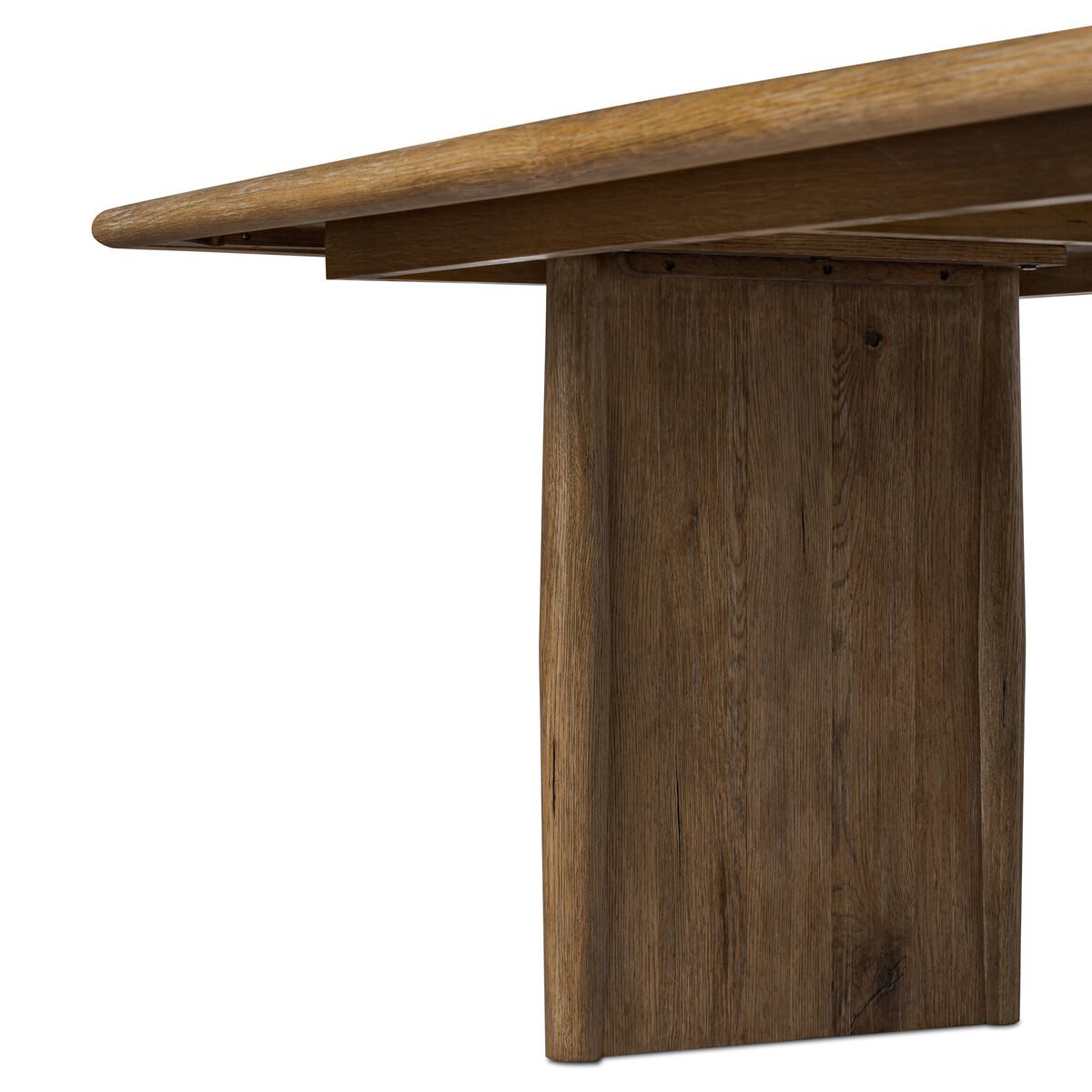 Close up of Four Hands 72" Glenview Dining Table in Weathered Oak Veneer on a white background at Addison West