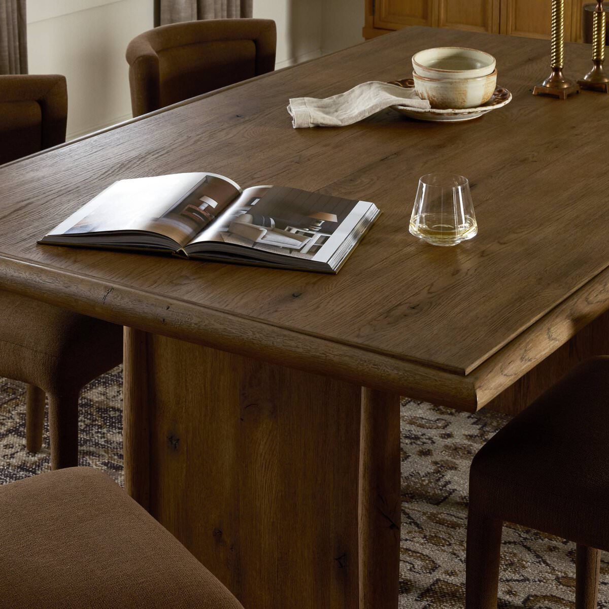 Close up of Four Hands 72" Glenview Dining Table in Weathered Oak Veneer in a dining room at Addison West