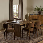 Four Hands 72" Glenview Dining Table in Weathered Oak Veneer in a dining room at Addison West