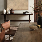 Close up of Four Hands 85.5" Glenview Dining Table in Weathered Oak Veneer in a dining room at Addison West