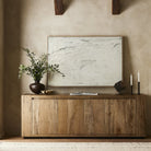 Four Hands Abaso Sideboard in Rustic Wormwood Oak in a living room at Addison West