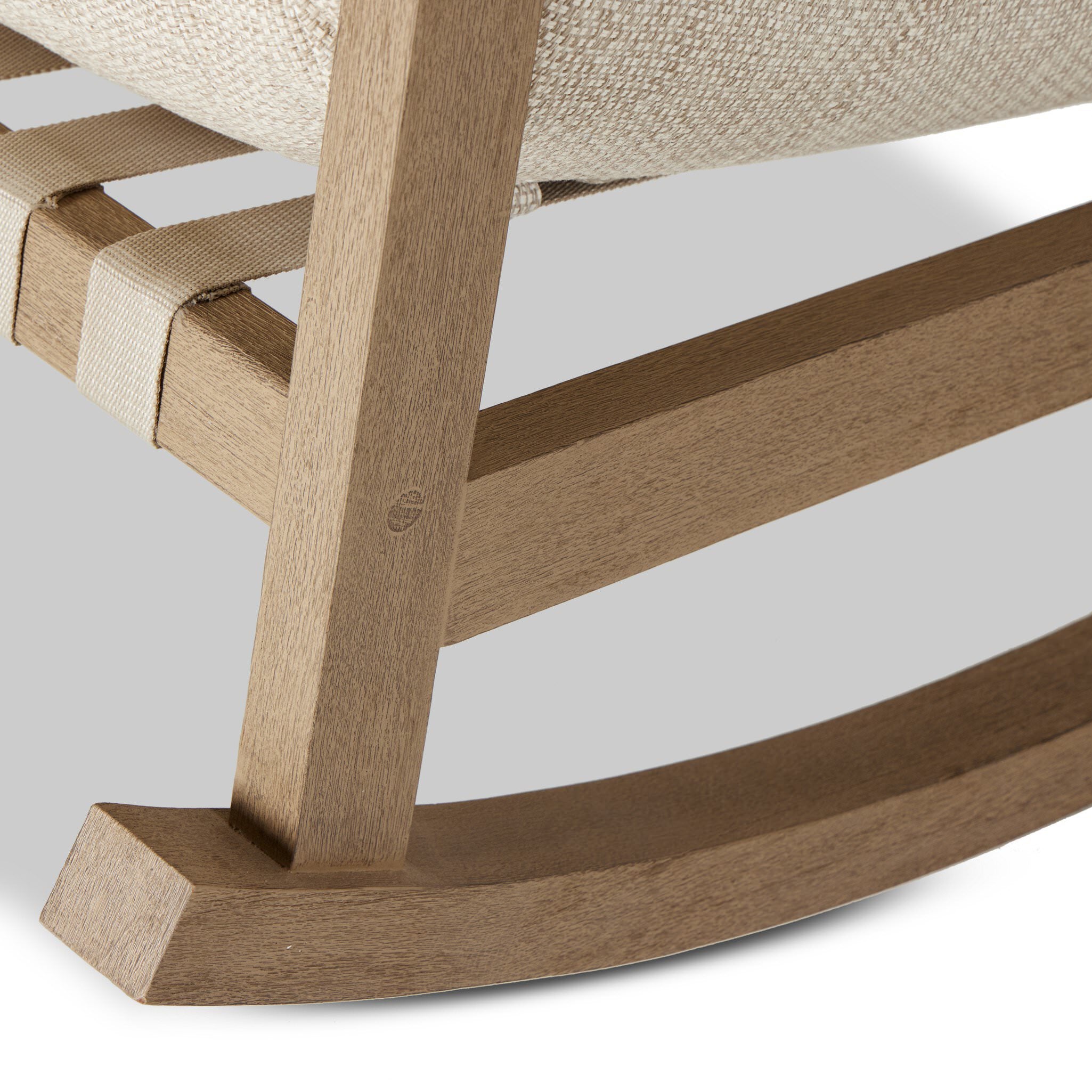 Close up of Four Hands Aiken Outdoor Rocking Chair in Faye Sand on a white background at Addison West