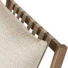 Close up of Four Hands Aiken Outdoor Rocking Chair in Faye Sand on a white background at Addison West
