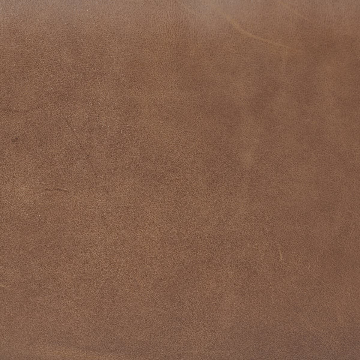 Close up of Four Hands Alec Storage Ottoman in Dulane Mahogany on a white background at Addison West
