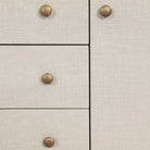 Close up of Four Hands Amelia Media Console in Light Antique Brass on a white background at Addison West