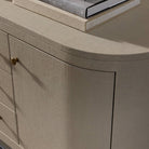 Close up of Four Hands Amelia Media Console in Light Antique Brass  at Addison West