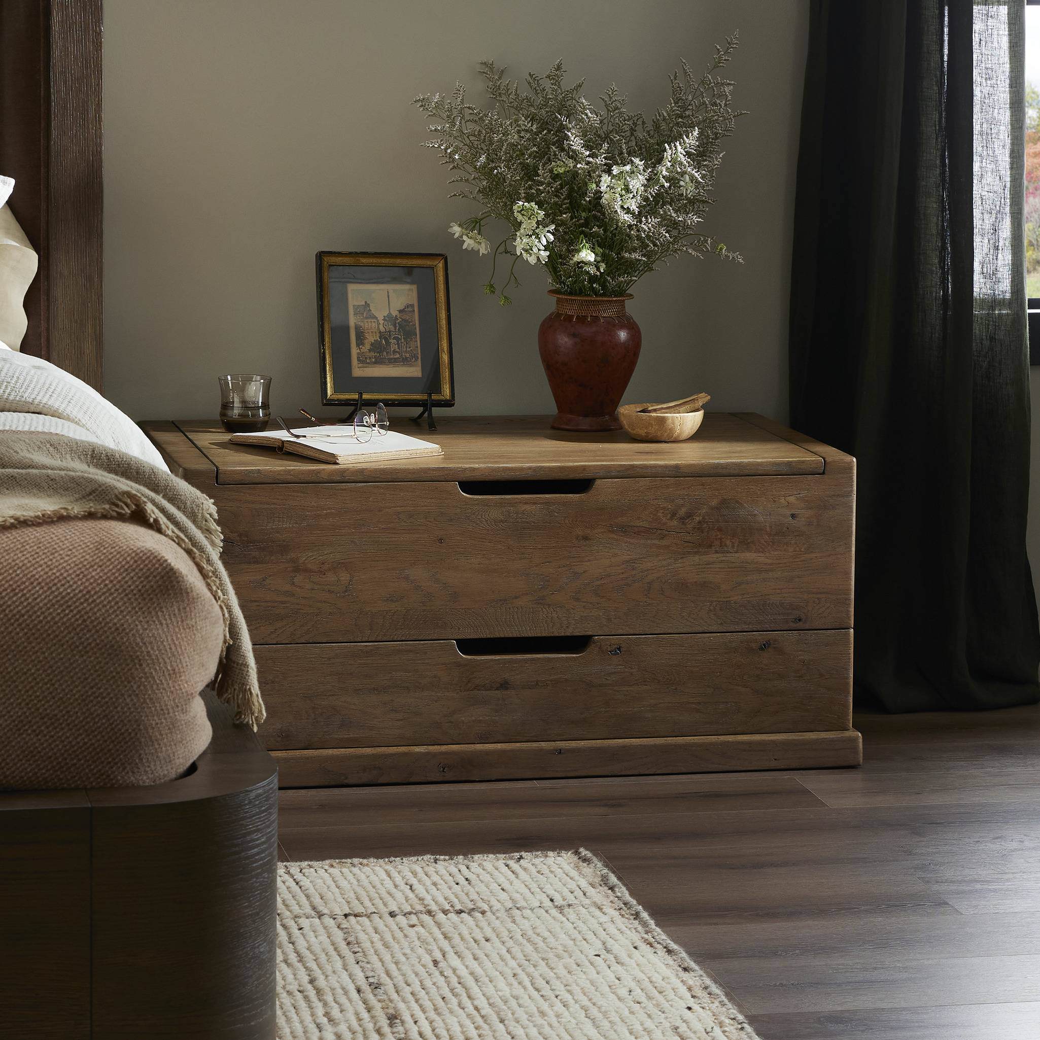 Four Hands Arizona Trunk in Weathered Oak in a bedroom at Addison West