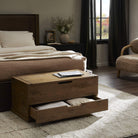 Four Hands Arizona Trunk in Weathered Oak in a bedroom at Addison West