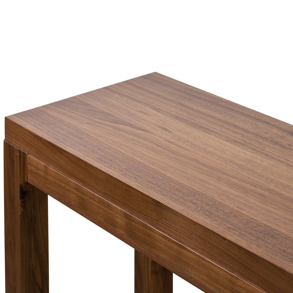 Close up of Four Hands Arturo Console Table in Natural Walnut Veneer on a white background