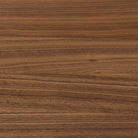 Close up of Four Hands Arturo Console Table in Natural Walnut Veneer on a white background