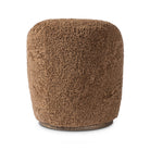 Four Hands Aurora Swivel Chair in Amber Shearling on a white background at Addison West