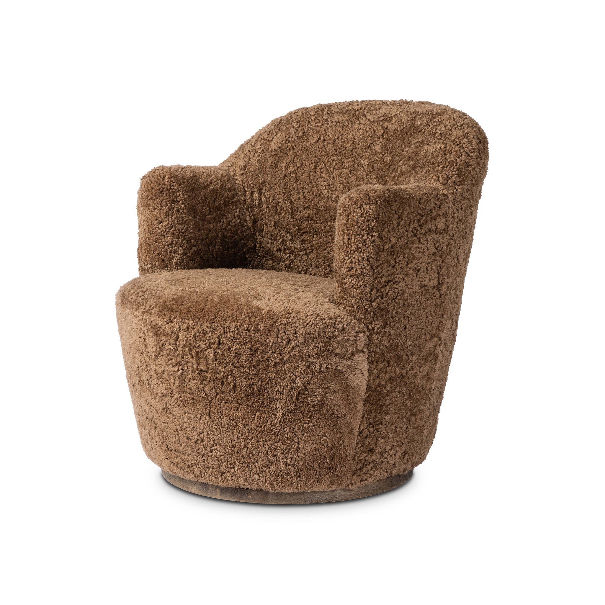 Four Hands Aurora Swivel Chair in Amber Shearling on a white background at Addison West