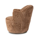 Four Hands Aurora Swivel Chair in Amber Shearling on a white background at Addison West