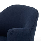 Close up of Four Hands Aurora Swivel Chair in Copenhagen Indigo on a white background at Addison West