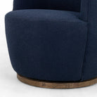 Close up of Four Hands Aurora Swivel Chair in Copenhagen Indigo on a white background at Addison West