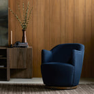 Four Hands Aurora Swivel Chair in Copenhagen Indigo in a living room at Addison West
