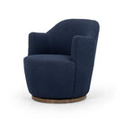 Four Hands Aurora Swivel Chair in Copenhagen Indigo on a white background at Addison West