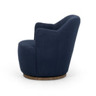 Four Hands Aurora Swivel Chair in Copenhagen Indigo on a white background at Addison West