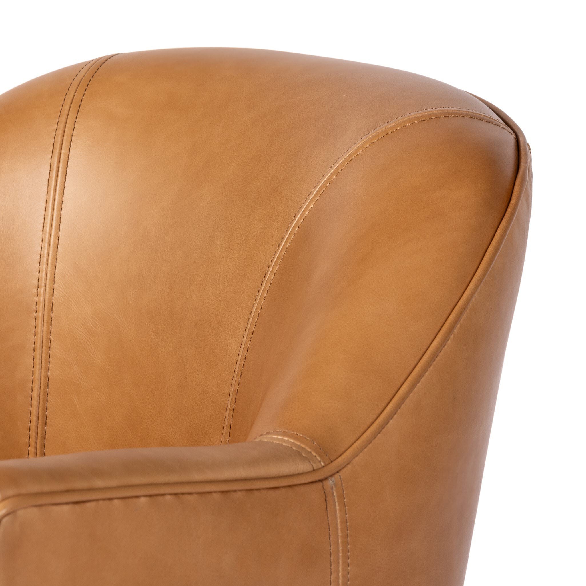 Close up of Four Hands Aurora Swivel Chair in Sonoma Butterscotch on a white background at Addison West
