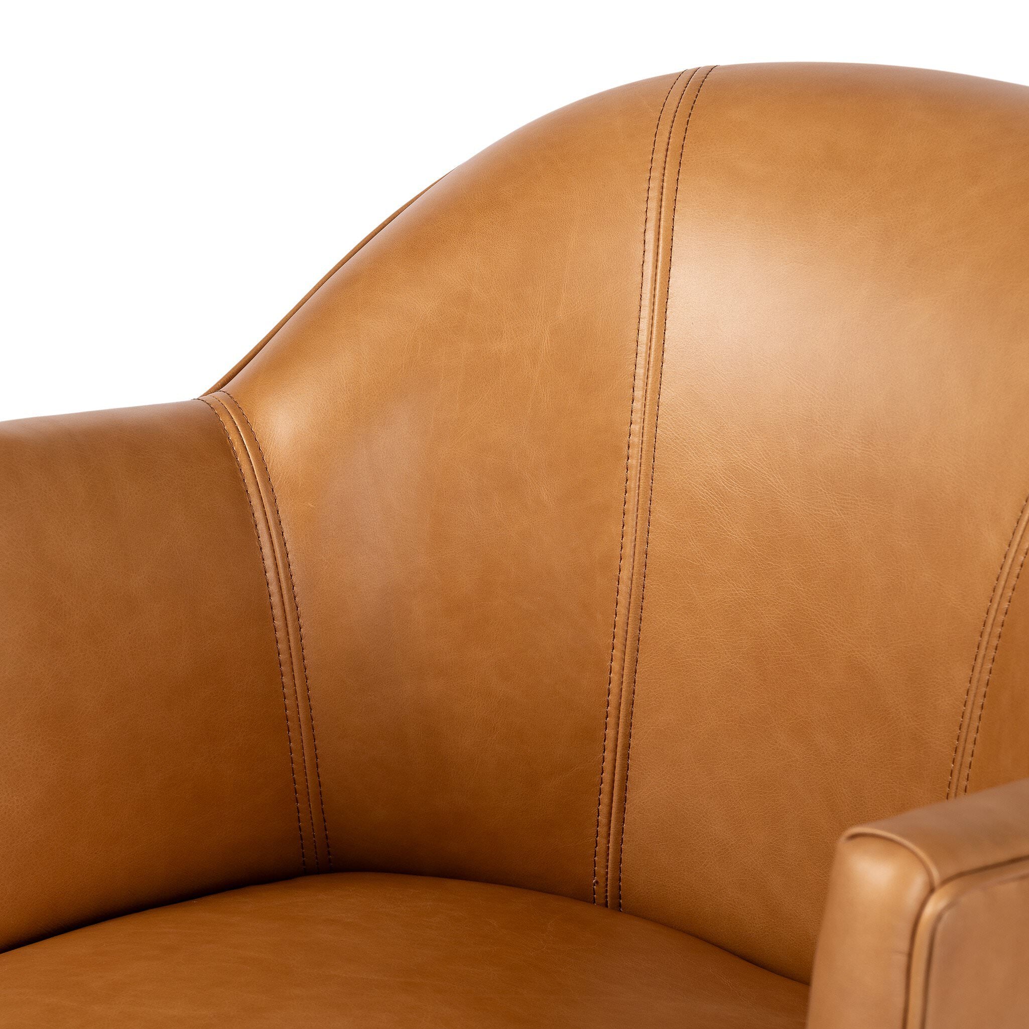 Close up of Four Hands Aurora Swivel Chair in Sonoma Butterscotch on a white background at Addison West