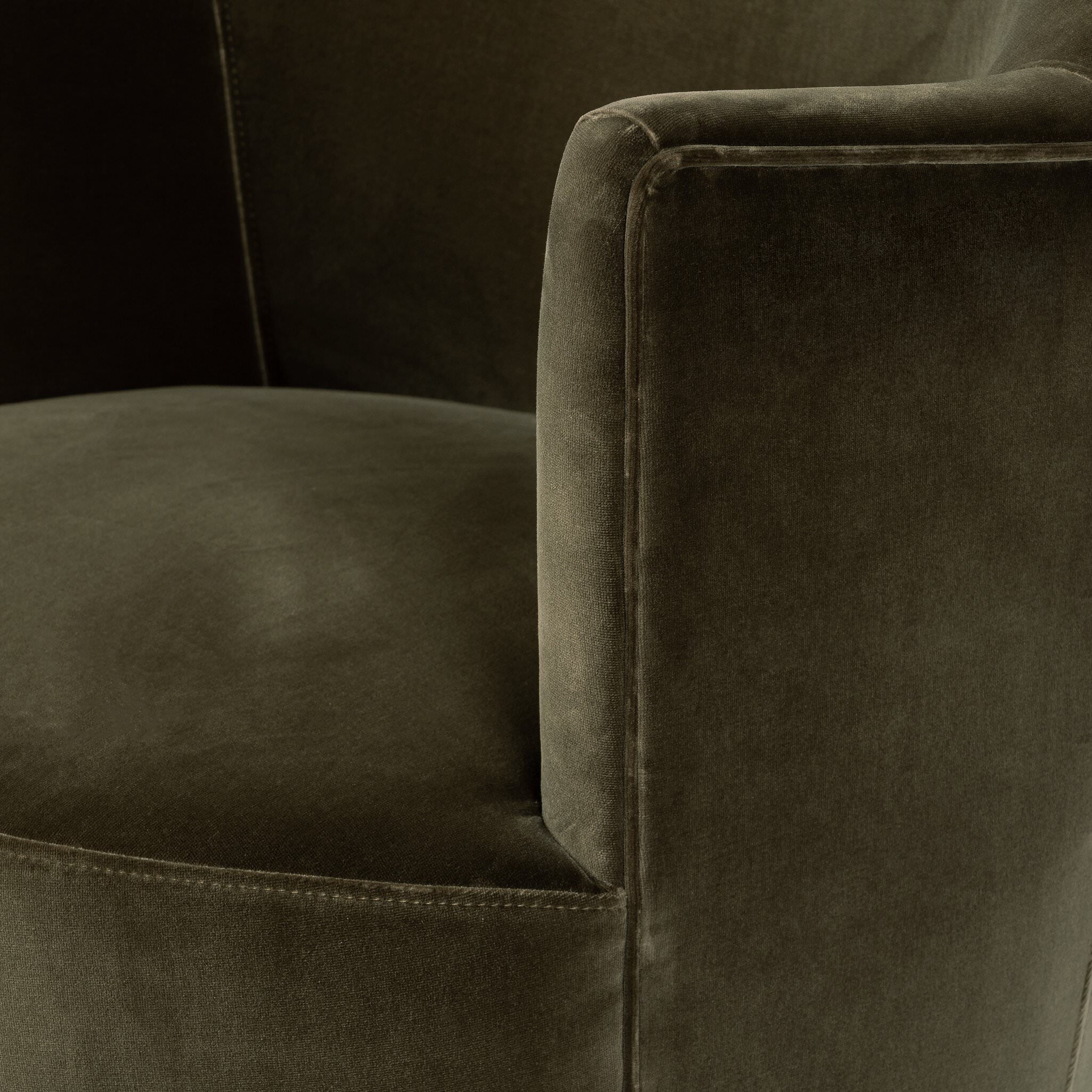 Close up of Four Hands Aurora Swivel Chair in Surrey Olive on a white background at Addison West