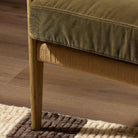 Close up of Four Hands Barwin Chair in Surrey Olive in a living room at Addison West
