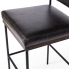 Close up of Four Hands Benton Counter Stool in Sonoma Black on white background at Addison West.