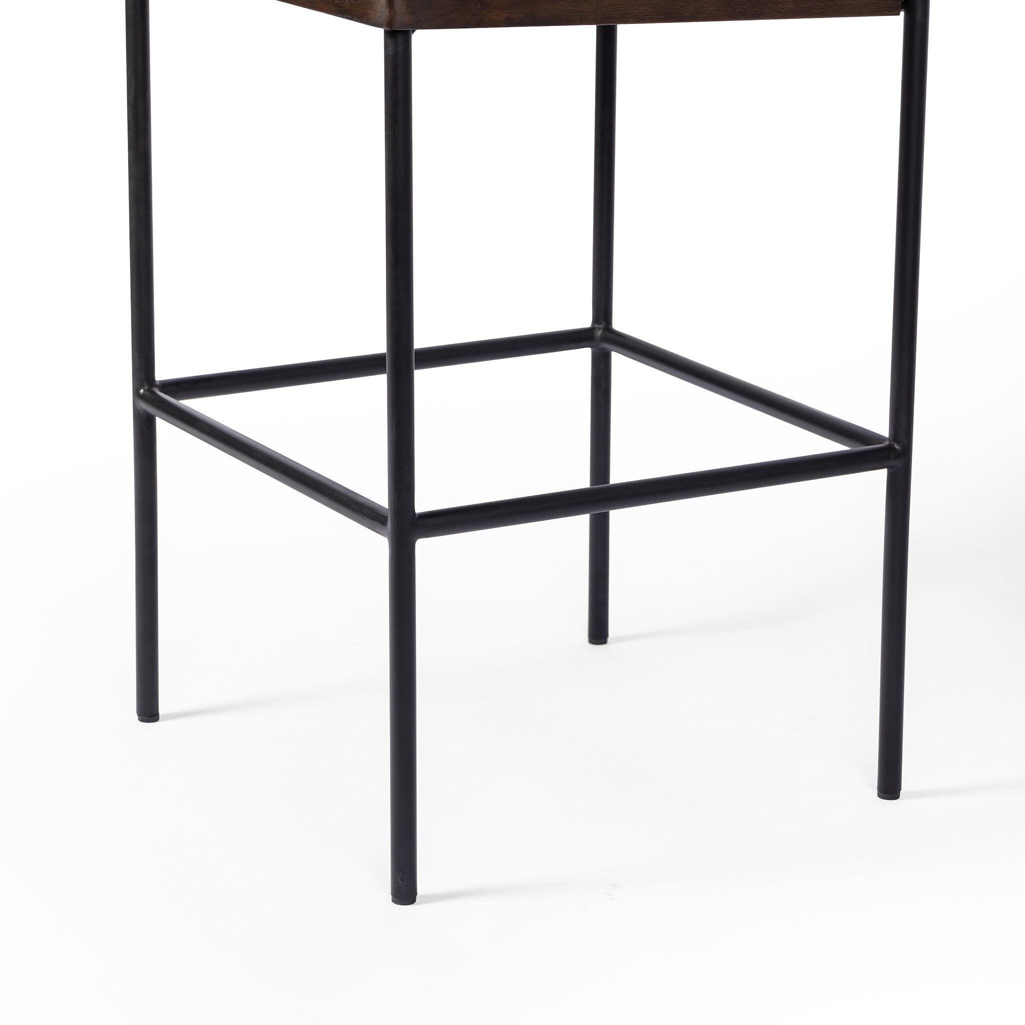 Close up of Four Hands Benton Counter Stool in Sonoma Black on white background at Addison West.