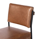 Close up of Four Hands Benton Counter Stool in Sonoma Chestnut on a white background at Addison West