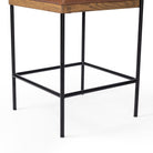 Close up of Four Hands Benton Counter Stool in Sonoma Chestnut on a white background at Addison West