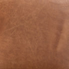 Close up of Four Hands Benton Counter Stool in Sonoma Chestnut on a white background at Addison West