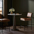 Four Hands Benton Counter Stool in Sonoma Chestnut in a dining room at Addison West