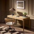 Four Hands Berke Desk in Aged Smoked Oak Veneer in an office at Addison West