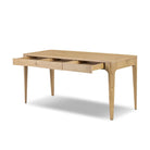 Four Hands Berke Desk in Aged Smoked Oak Veneer on a white background at Addison West