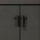 Four Hands Berlin Media Console in Dark Green Lacquered Linen on white background at Addison West.