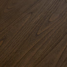 Detail image of the Four Hands Bertie Coffee Table Stained Saddle Brown Sungkai Veneer on white background at Addison West.