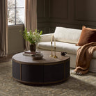 Four Hands Bertie Coffee Table Stained Saddle Brown Sungkai Veneer in living room at Addison West.