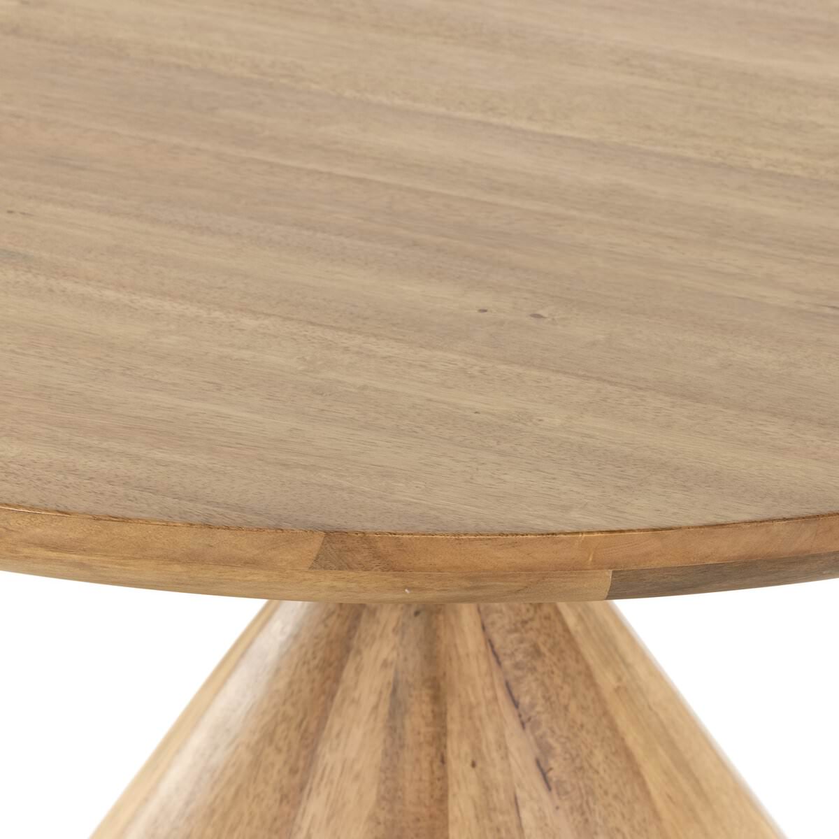 Close up of Four Hands Bibianna Round 60" Dining Table in Blush Marble on a white background