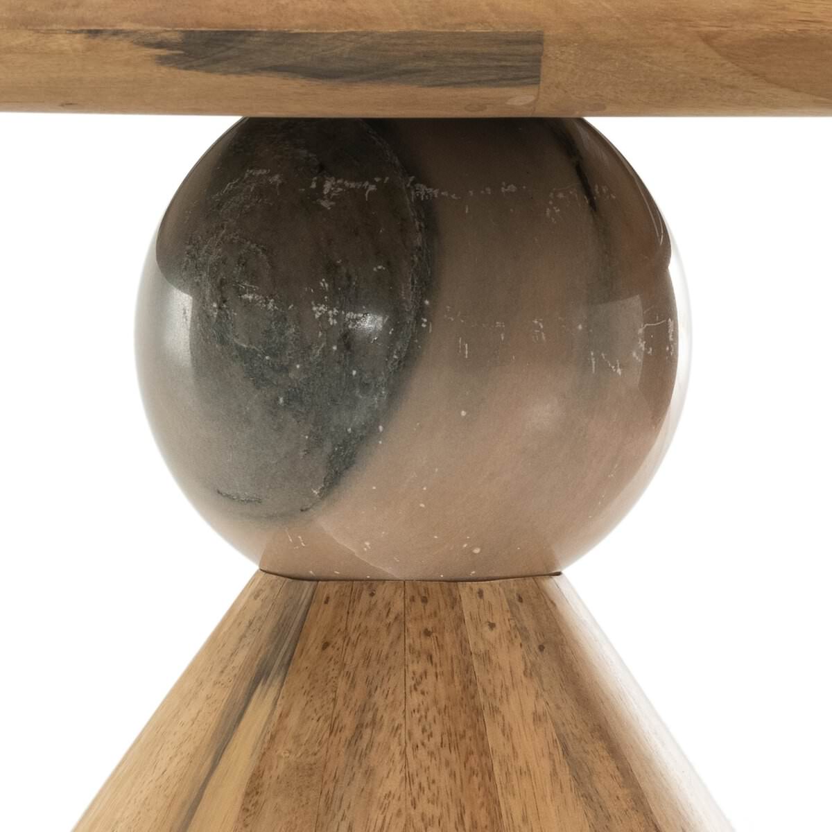 Close up of Four Hands Bibianna Round 60" Dining Table in Blush Marble on a white background