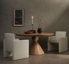 Four Hands Bibianna Round 60" Dining Table in Blush Marble in a modern dining room