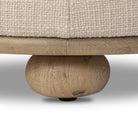 Close up of Four Hands Bilbury Ottoman in Saxon Sand on a white background at Addison West