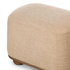 Close up of Four Hands Bilbury Oval Ottoman in Saxon Sand on a white background at Addison West