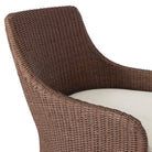 Close up of Four Hands Blaire Outdoor Swivel Chair in Tanned Weave on a white background at Addison West