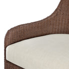 Close up of Four Hands Blaire Outdoor Swivel Chair in Tanned Weave on a white background at Addison West