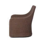 Four Hands Blaire Outdoor Swivel Chair in Tanned Weave on a white background at Addison West
