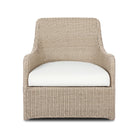 Four Hands Blaire Outdoor Swivel Chair in Vintage White on a white background at Addison West