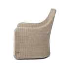 Four Hands Blaire Outdoor Swivel Chair in Vintage White on a white background at Addison West