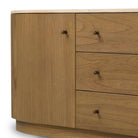 Close up of Four Hands Boa Media Console in Sandy Mindi on a white background at Addison West